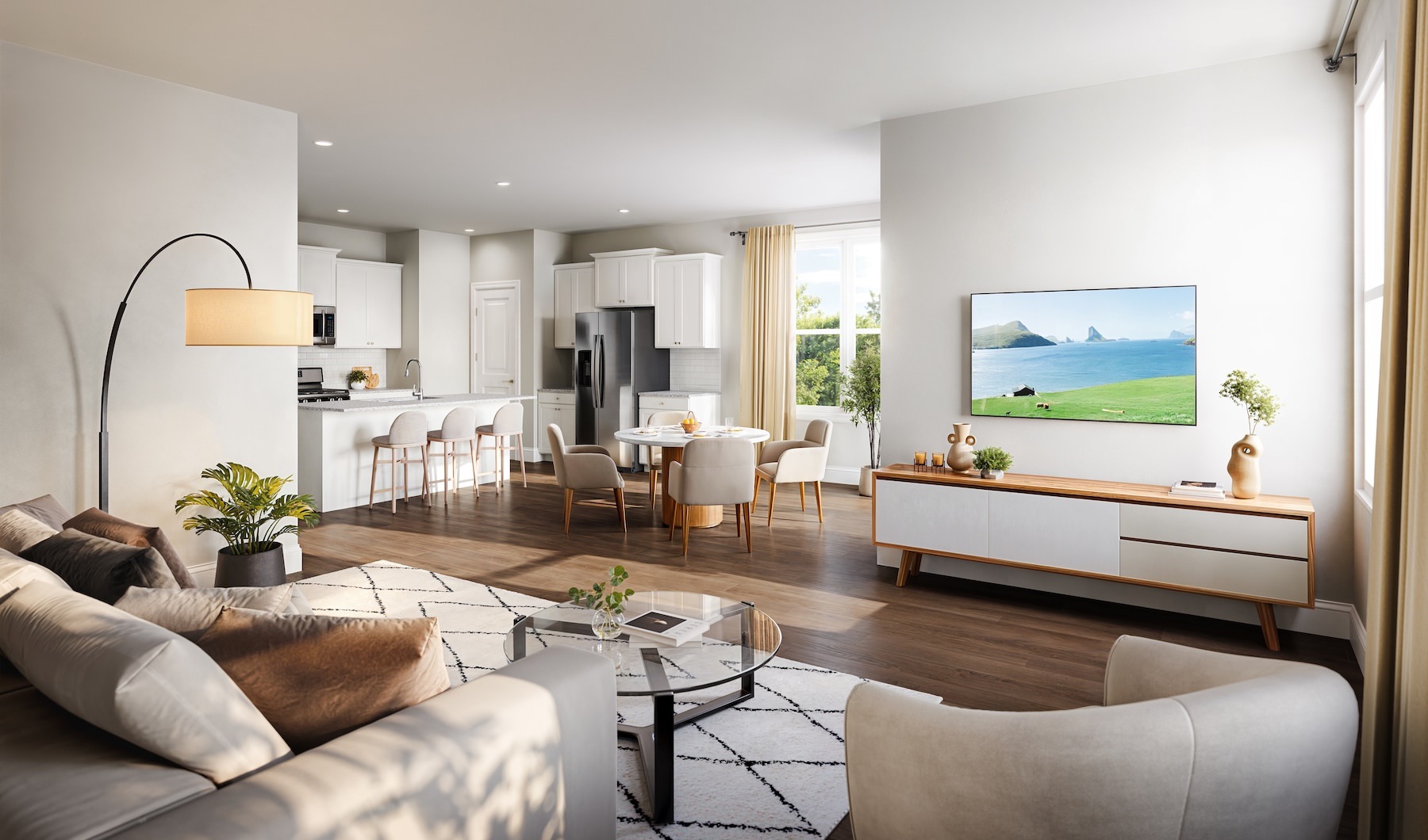 a living room with a couch, tv and a table