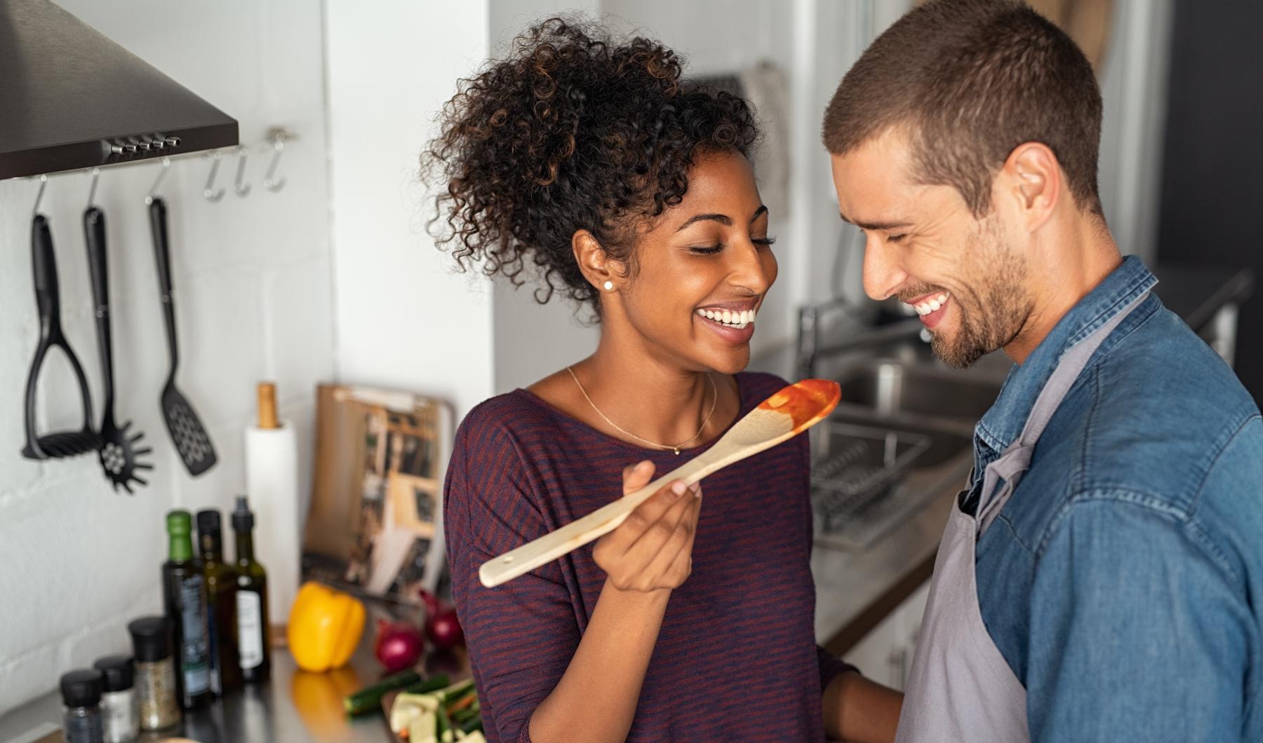 a man and a woman smiling