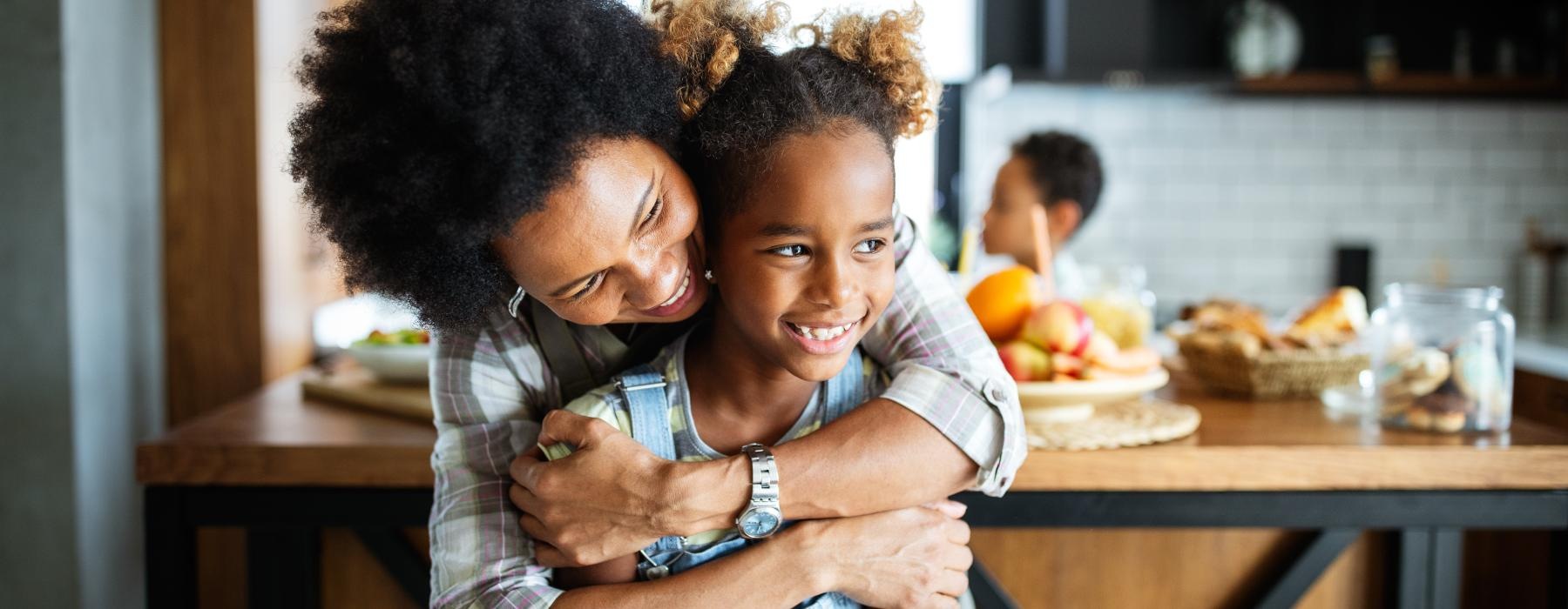 a person hugging a child