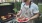 a man holding a plate of food